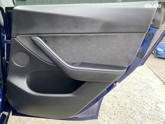 Синій Тесла Model Y, об'ємом двигуна 0 л та пробігом 91 тис. км за 25990 $, фото 18 на Automoto.ua