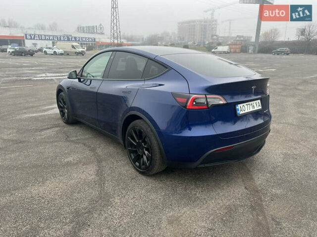 Синий Тесла Model Y, объемом двигателя 0 л и пробегом 125 тыс. км за 25997 $, фото 24 на Automoto.ua