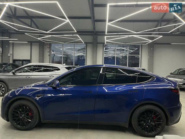 Синий Тесла Model Y, объемом двигателя 0 л и пробегом 68 тыс. км за 29900 $, фото 3 на Automoto.ua