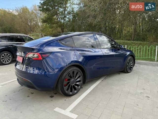 Синий Тесла Model Y, объемом двигателя 0 л и пробегом 86 тыс. км за 25900 $, фото 47 на Automoto.ua