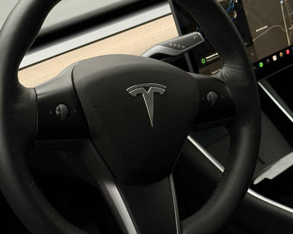 Синий Тесла Model Y, объемом двигателя 0 л и пробегом 93 тыс. км за 18800 $, фото 11 на Automoto.ua