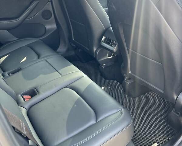 Синий Тесла Model Y, объемом двигателя 0 л и пробегом 61 тыс. км за 26500 $, фото 9 на Automoto.ua