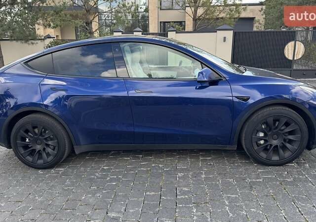Синій Тесла Model Y, об'ємом двигуна 0 л та пробігом 66 тис. км за 28351 $, фото 9 на Automoto.ua