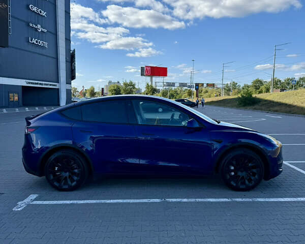 Синий Тесла Model Y, объемом двигателя 0 л и пробегом 48 тыс. км за 27500 $, фото 2 на Automoto.ua