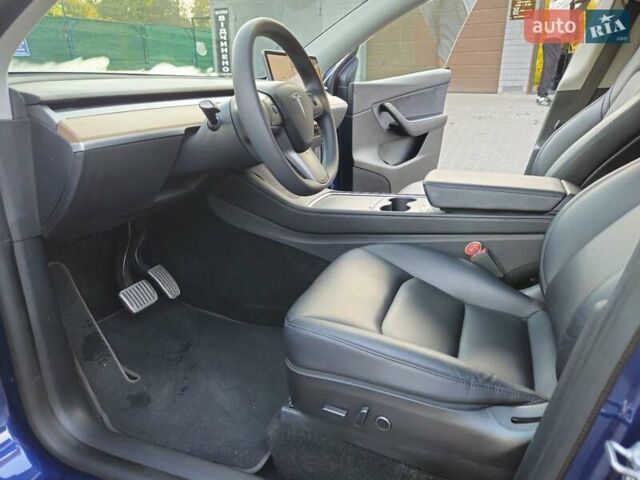 Синий Тесла Model Y, объемом двигателя 0 л и пробегом 99 тыс. км за 26500 $, фото 33 на Automoto.ua
