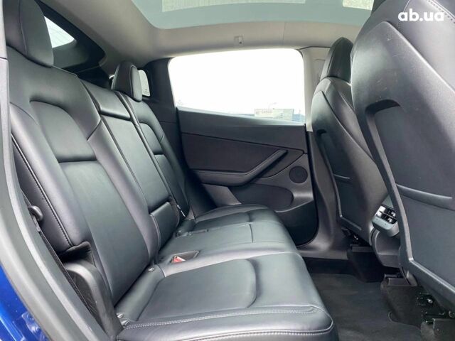Синій Тесла Model Y, об'ємом двигуна 0 л та пробігом 91 тис. км за 25990 $, фото 20 на Automoto.ua
