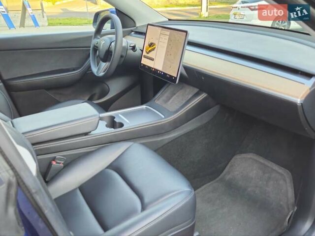 Синий Тесла Model Y, объемом двигателя 0 л и пробегом 99 тыс. км за 26500 $, фото 22 на Automoto.ua
