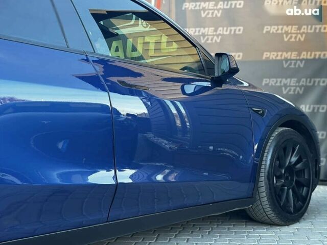 Синий Тесла Model Y, объемом двигателя 0 л и пробегом 83 тыс. км за 28000 $, фото 25 на Automoto.ua
