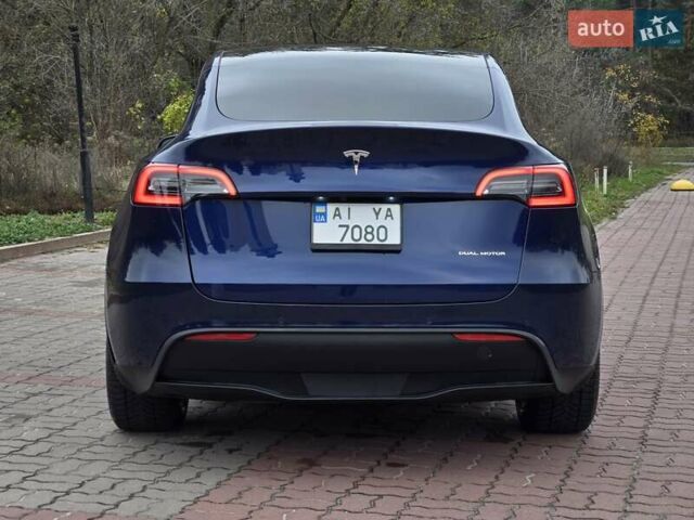 Синий Тесла Model Y, объемом двигателя 0 л и пробегом 99 тыс. км за 25500 $, фото 20 на Automoto.ua