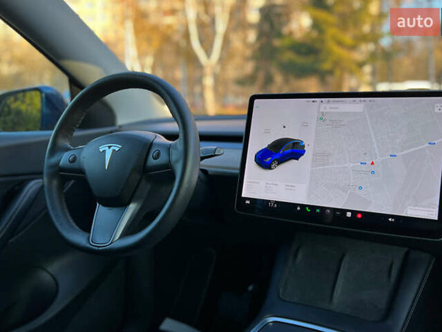 Синий Тесла Model Y, объемом двигателя 0 л и пробегом 72 тыс. км за 25750 $, фото 18 на Automoto.ua