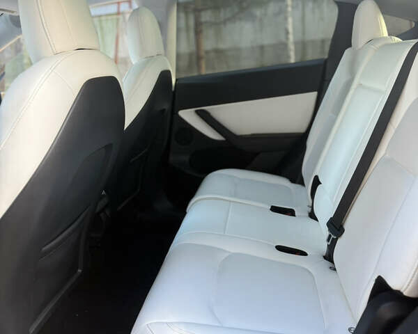 Синий Тесла Model Y, объемом двигателя 0 л и пробегом 97 тыс. км за 26500 $, фото 17 на Automoto.ua