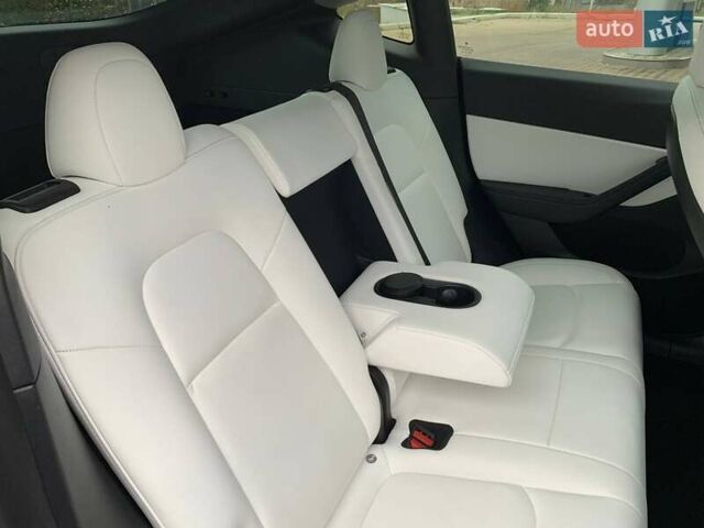 Синий Тесла Model Y, объемом двигателя 0 л и пробегом 130 тыс. км за 23500 $, фото 13 на Automoto.ua