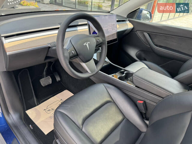 Синий Тесла Model Y, объемом двигателя 0 л и пробегом 83 тыс. км за 24999 $, фото 12 на Automoto.ua