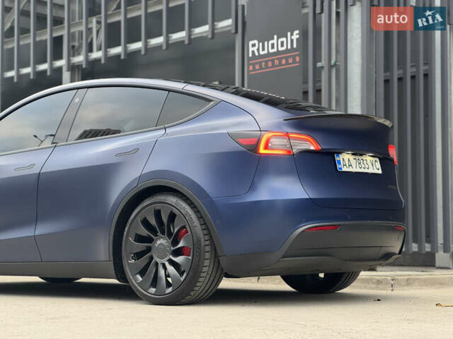 Синий Тесла Model Y, объемом двигателя 0 л и пробегом 88 тыс. км за 31990 $, фото 7 на Automoto.ua