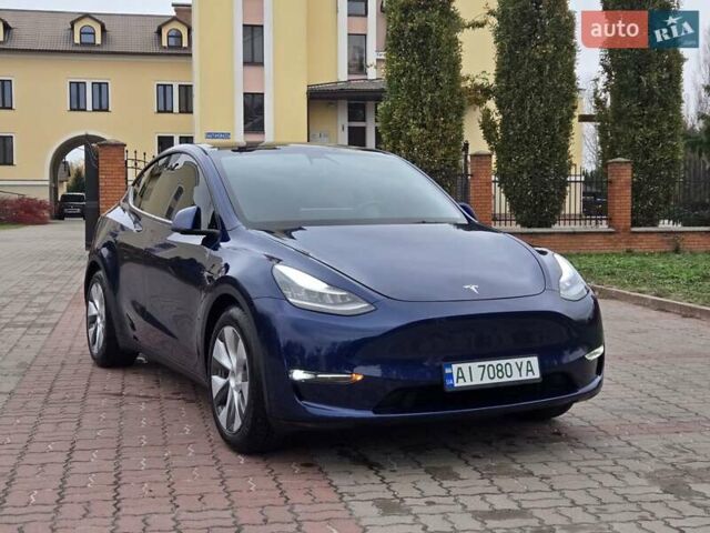 Синий Тесла Model Y, объемом двигателя 0 л и пробегом 99 тыс. км за 25500 $, фото 6 на Automoto.ua