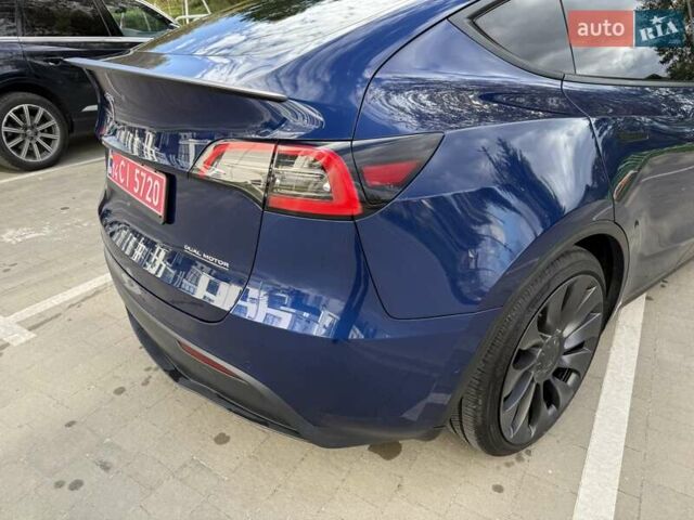 Синий Тесла Model Y, объемом двигателя 0 л и пробегом 86 тыс. км за 25900 $, фото 63 на Automoto.ua