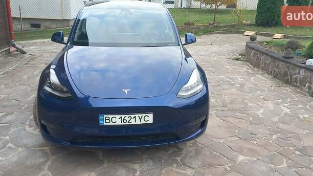 Синий Тесла Model Y, объемом двигателя 0 л и пробегом 74 тыс. км за 26500 $, фото 1 на Automoto.ua