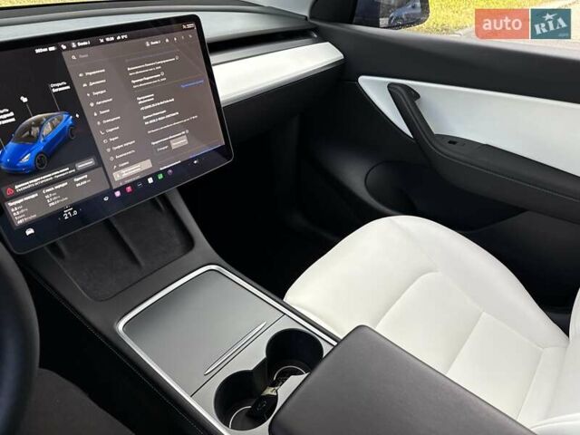 Синий Тесла Model Y, объемом двигателя 0 л и пробегом 87 тыс. км за 23999 $, фото 54 на Automoto.ua