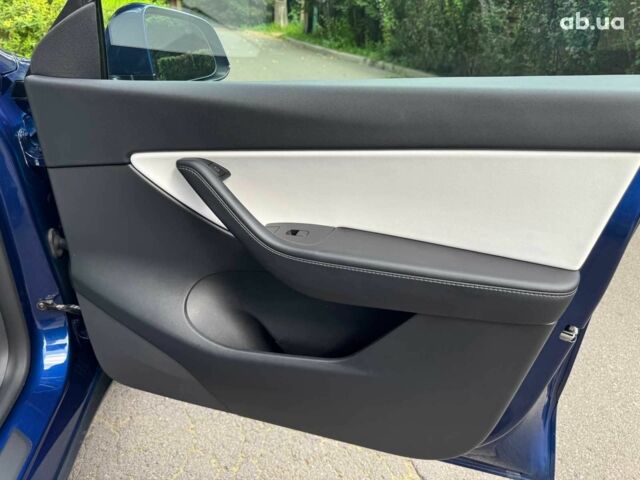 Тесла Model Y 2021 в Киеве на Automoto.ua Синий Тесла Model Y, объемом двигателя 0 л и пробегом 86 тыс. км за 19390 $, фото 25 на Automoto.ua