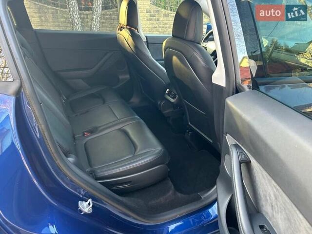 Синий Тесла Model Y, объемом двигателя 0 л и пробегом 62 тыс. км за 25800 $, фото 11 на Automoto.ua