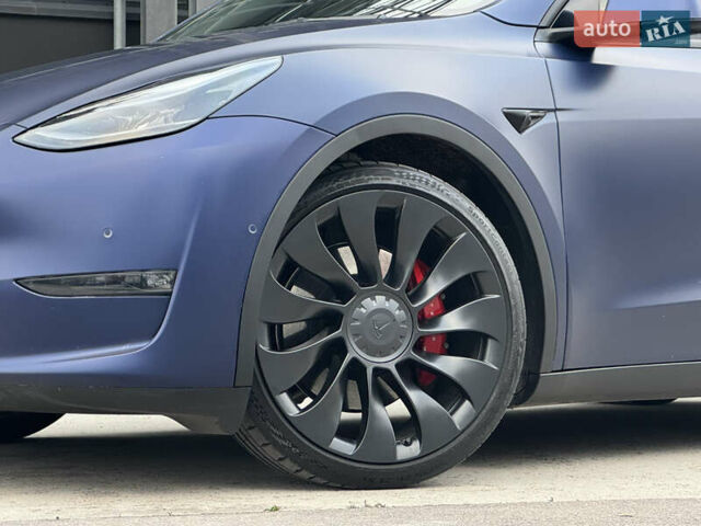 Синий Тесла Model Y, объемом двигателя 0 л и пробегом 88 тыс. км за 31990 $, фото 6 на Automoto.ua