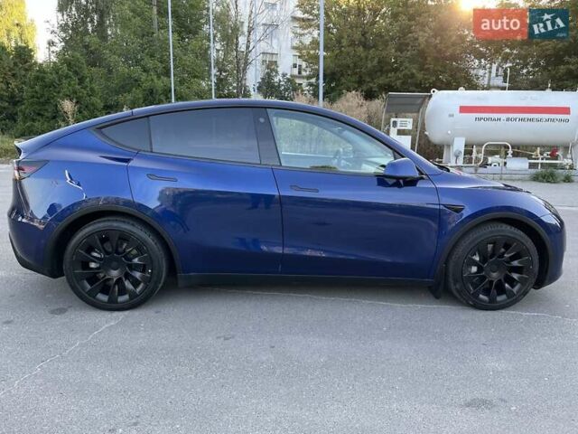 Синий Тесла Model Y, объемом двигателя 0 л и пробегом 68 тыс. км за 25000 $, фото 4 на Automoto.ua