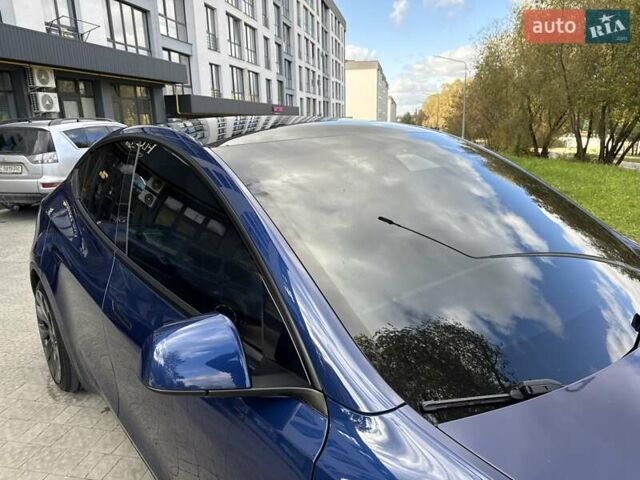 Синий Тесла Model Y, объемом двигателя 0 л и пробегом 87 тыс. км за 23900 $, фото 25 на Automoto.ua