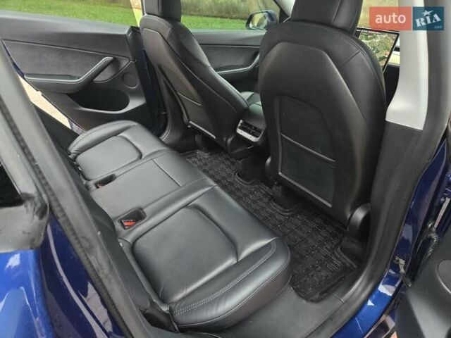 Синий Тесла Model Y, объемом двигателя 0 л и пробегом 99 тыс. км за 25500 $, фото 30 на Automoto.ua