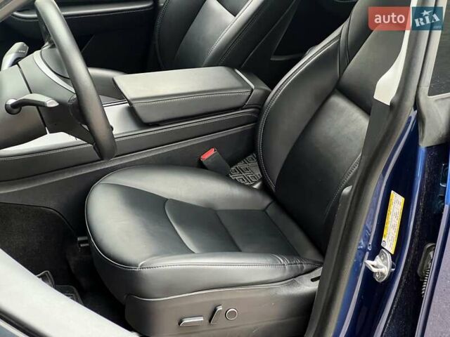 Синий Тесла Model Y, объемом двигателя 0 л и пробегом 66 тыс. км за 25500 $, фото 12 на Automoto.ua
