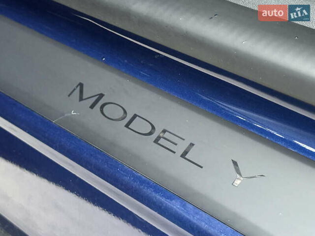 Синий Тесла Model Y, объемом двигателя 0 л и пробегом 88 тыс. км за 31990 $, фото 29 на Automoto.ua