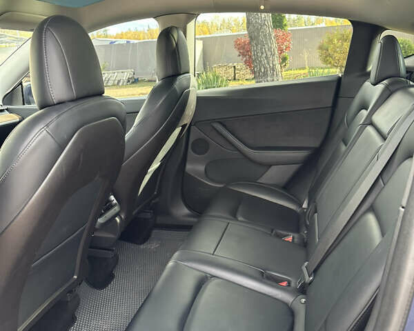Синий Тесла Model Y, объемом двигателя 0 л и пробегом 116 тыс. км за 22999 $, фото 10 на Automoto.ua