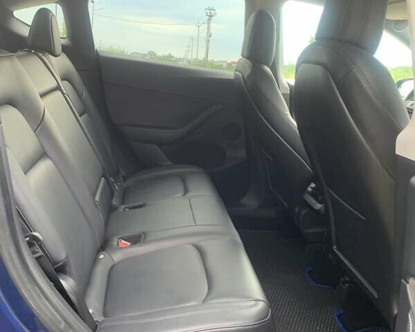 Синий Тесла Model Y, объемом двигателя 0 л и пробегом 75 тыс. км за 22900 $, фото 10 на Automoto.ua