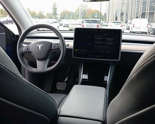 Синий Тесла Model Y, объемом двигателя 0 л и пробегом 50 тыс. км за 26500 $, фото 7 на Automoto.ua