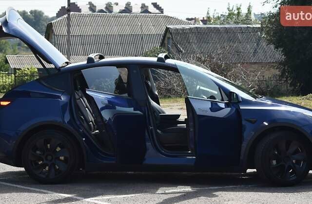 Синий Тесла Model Y, объемом двигателя 0 л и пробегом 81 тыс. км за 25499 $, фото 15 на Automoto.ua