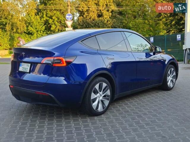 Синий Тесла Model Y, объемом двигателя 0 л и пробегом 99 тыс. км за 26500 $, фото 12 на Automoto.ua