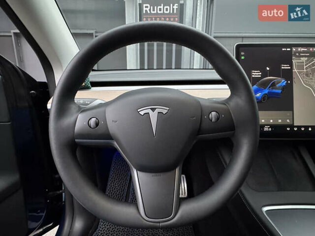 Синий Тесла Model Y, объемом двигателя 0 л и пробегом 88 тыс. км за 31990 $, фото 44 на Automoto.ua