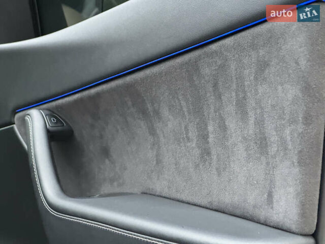 Синий Тесла Model Y, объемом двигателя 0 л и пробегом 88 тыс. км за 31990 $, фото 37 на Automoto.ua