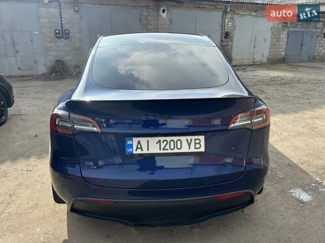 Синий Тесла Model Y, объемом двигателя 0 л и пробегом 101 тыс. км за 23999 $, фото 12 на Automoto.ua