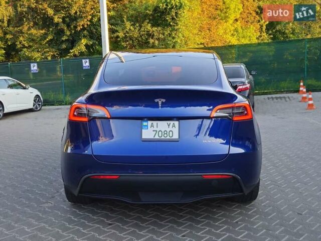 Синий Тесла Model Y, объемом двигателя 0 л и пробегом 99 тыс. км за 26500 $, фото 15 на Automoto.ua