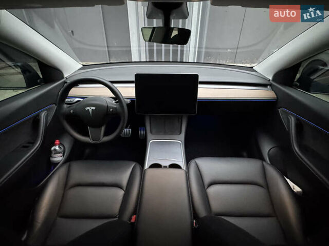 Синий Тесла Model Y, объемом двигателя 0 л и пробегом 88 тыс. км за 31990 $, фото 41 на Automoto.ua