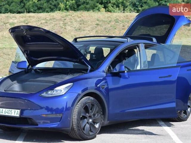 Синий Тесла Model Y, объемом двигателя 0 л и пробегом 81 тыс. км за 25499 $, фото 24 на Automoto.ua
