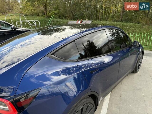 Синий Тесла Model Y, объемом двигателя 0 л и пробегом 86 тыс. км за 25900 $, фото 69 на Automoto.ua