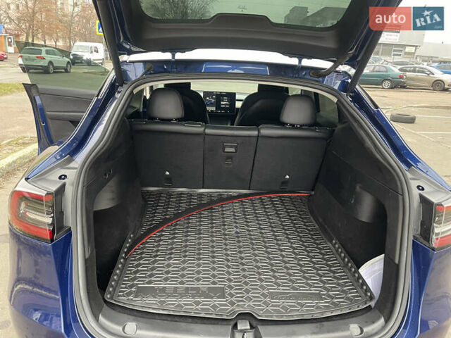 Синий Тесла Model Y, объемом двигателя 0 л и пробегом 127 тыс. км за 22300 $, фото 6 на Automoto.ua
