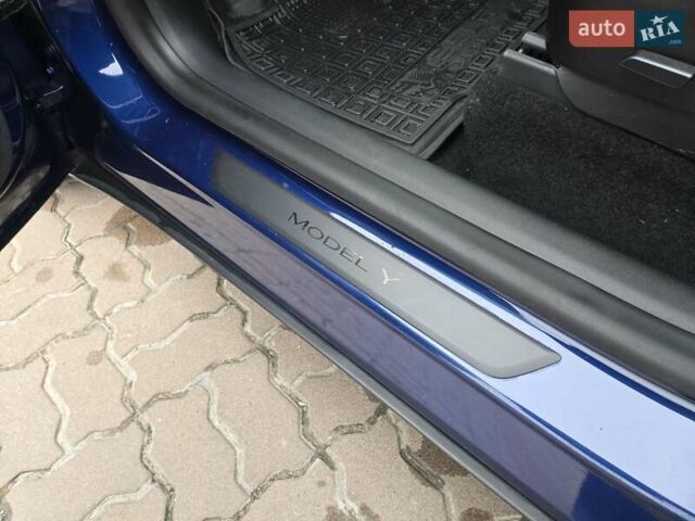 Синий Тесла Model Y, объемом двигателя 0 л и пробегом 99 тыс. км за 25500 $, фото 34 на Automoto.ua