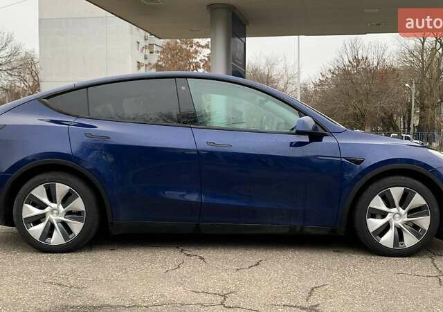 Синий Тесла Model Y, объемом двигателя 0 л и пробегом 130 тыс. км за 23500 $, фото 3 на Automoto.ua