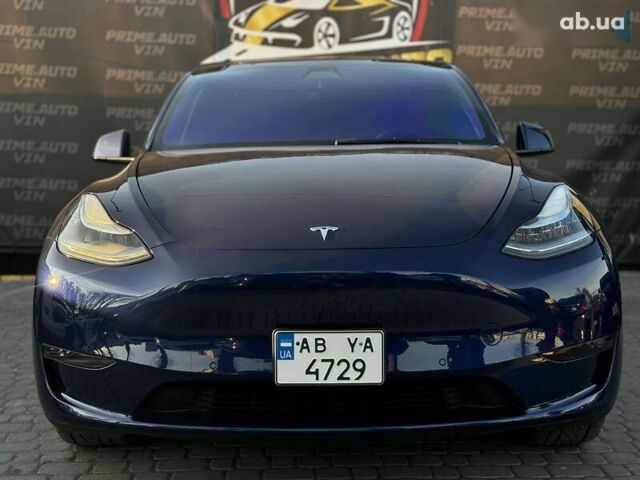 Синий Тесла Model Y, объемом двигателя 0 л и пробегом 83 тыс. км за 28000 $, фото 1 на Automoto.ua