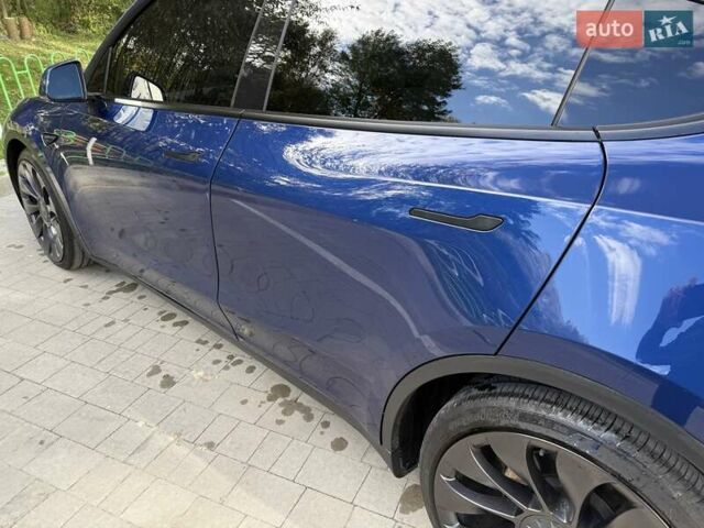 Синий Тесла Model Y, объемом двигателя 0 л и пробегом 86 тыс. км за 25900 $, фото 60 на Automoto.ua