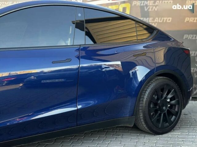 Синий Тесла Model Y, объемом двигателя 0 л и пробегом 83 тыс. км за 28000 $, фото 10 на Automoto.ua
