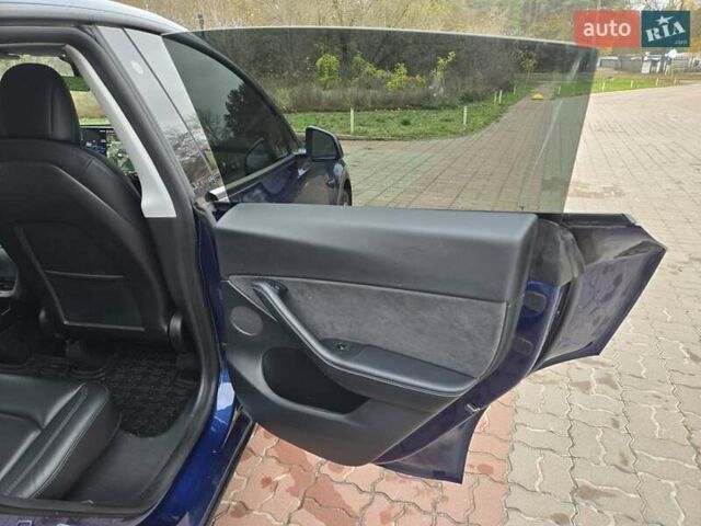 Синий Тесла Model Y, объемом двигателя 0 л и пробегом 99 тыс. км за 25500 $, фото 32 на Automoto.ua