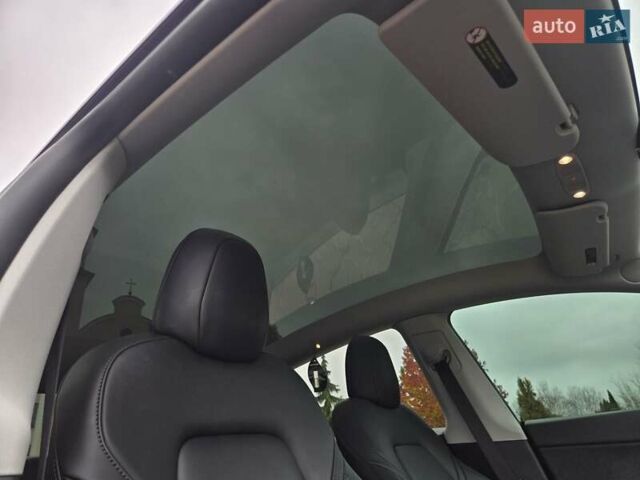 Синий Тесла Model Y, объемом двигателя 0 л и пробегом 99 тыс. км за 25500 $, фото 24 на Automoto.ua